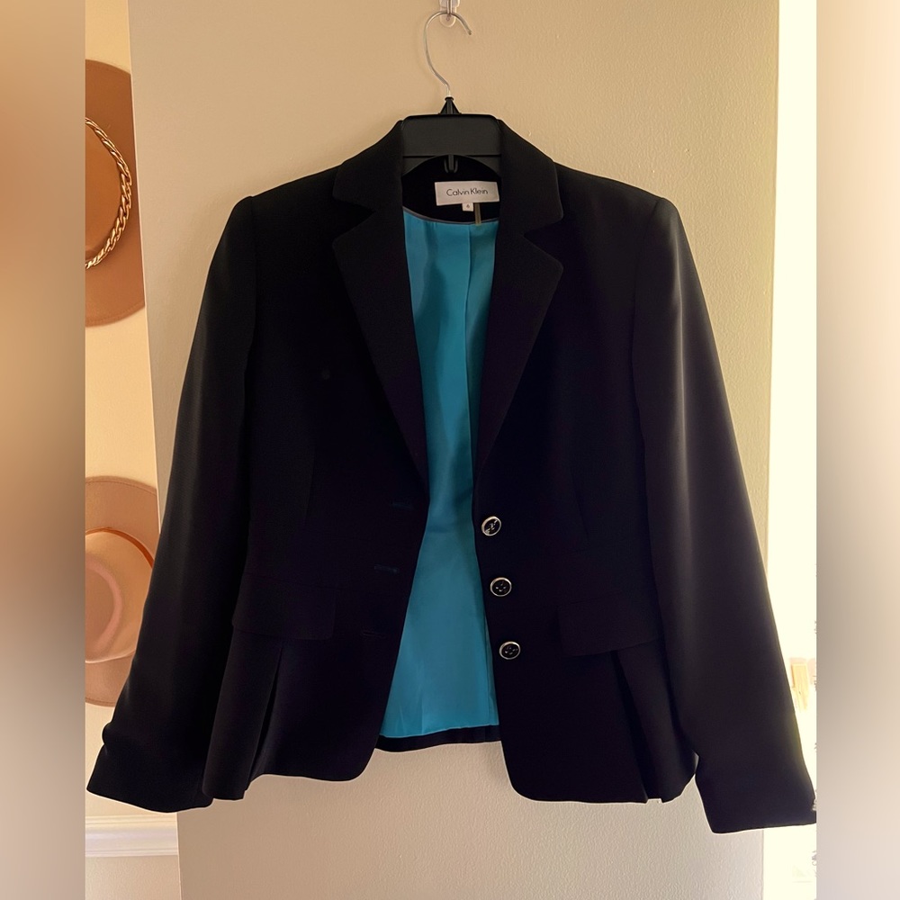Black Calvin Klein blazer; size 6; pleated design with silver and black buttons